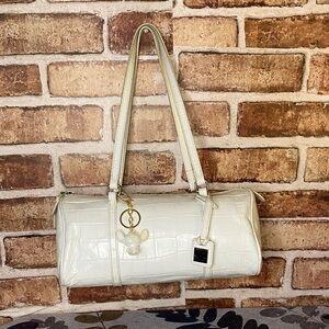 Dooney & Bourke Vtg Nile collection Barrel Shoulder Bag with Charm (rare)